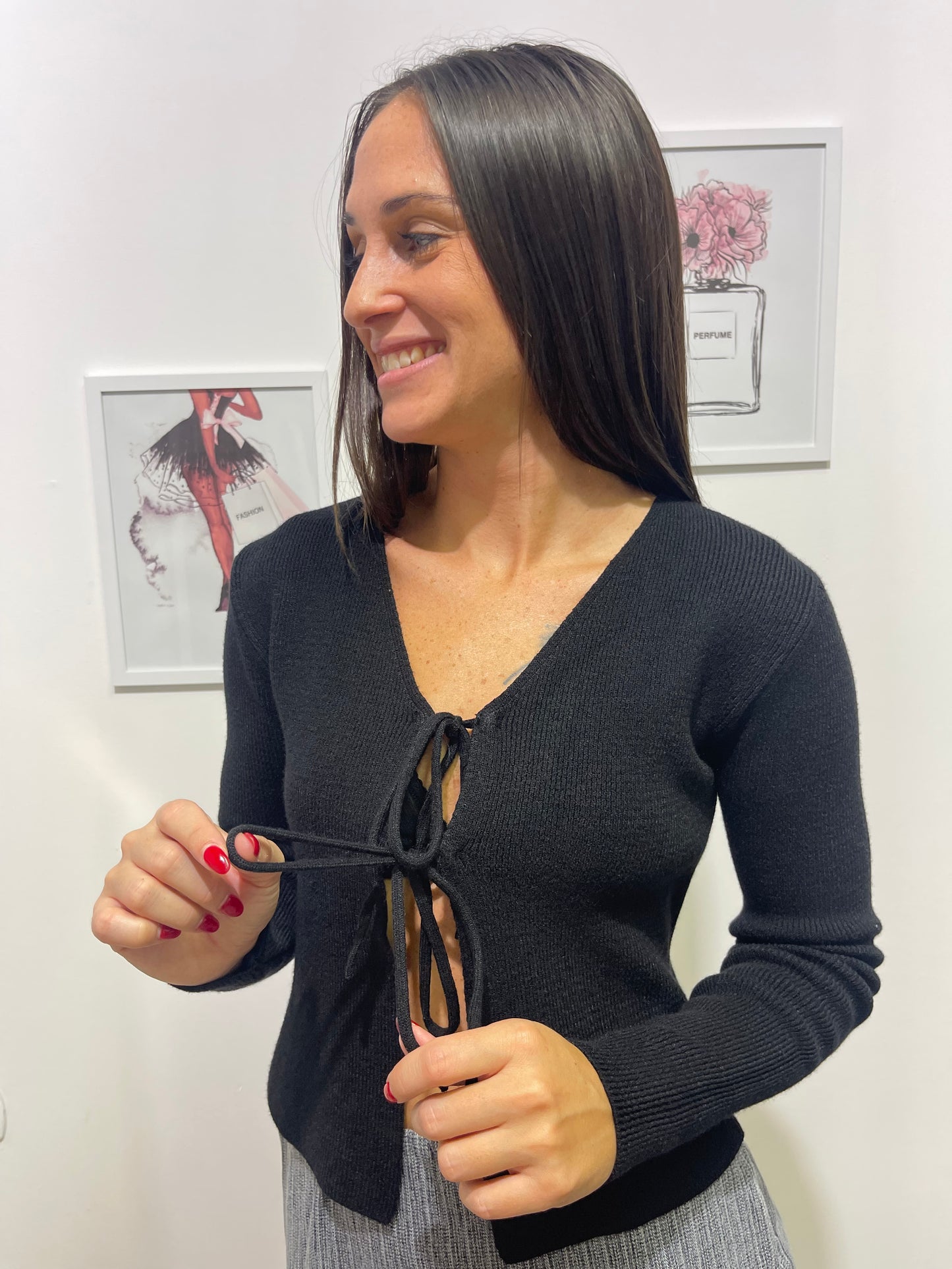 Maglione nero con fiocco