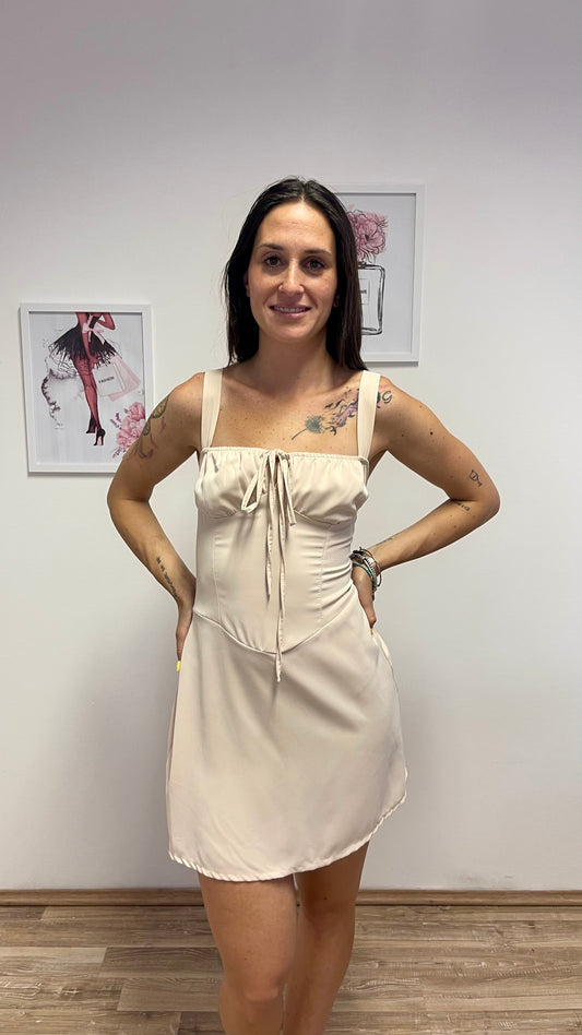 Vestito corto beje con fiocco